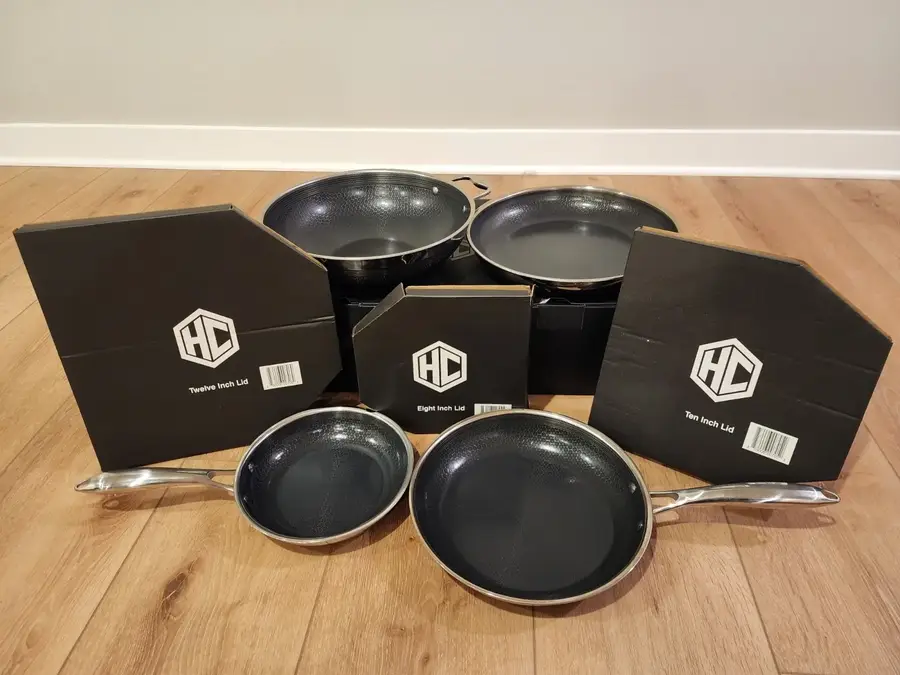 HexClad Hybrid 7-Piece Cookware Set — all seven pieces with their lid boxes